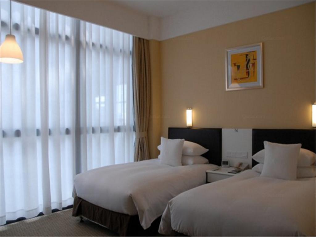 Gloria Plaza Hotel Kangqiao Xangai Exterior foto