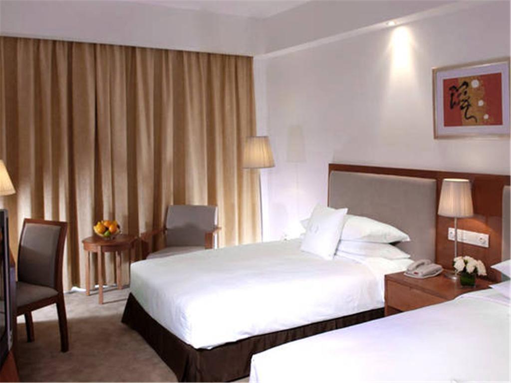 Gloria Plaza Hotel Kangqiao Xangai Exterior foto