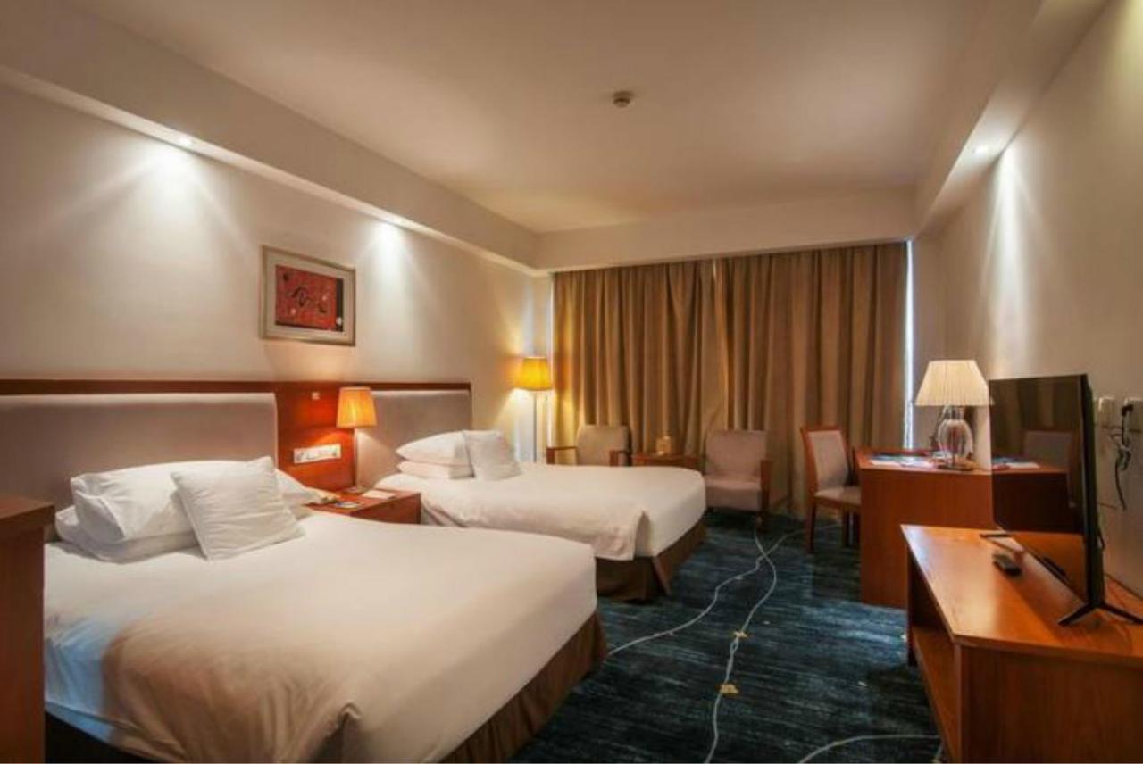 Gloria Plaza Hotel Kangqiao Xangai Exterior foto