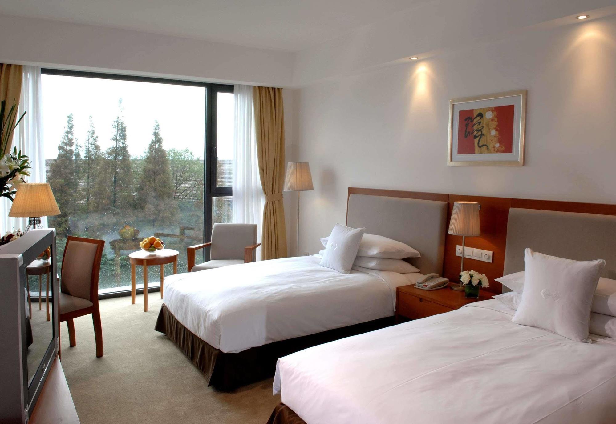 Gloria Plaza Hotel Kangqiao Xangai Exterior foto